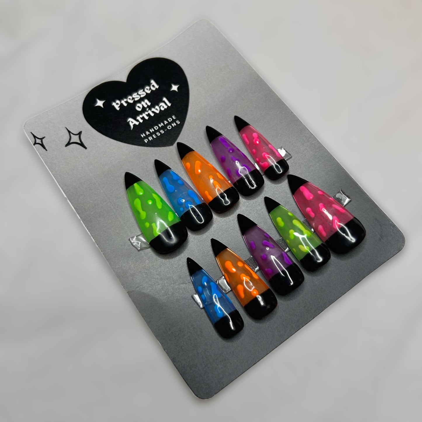 Medium stiletto lava lamp nails￼